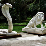 Two large statues of a snake and lion